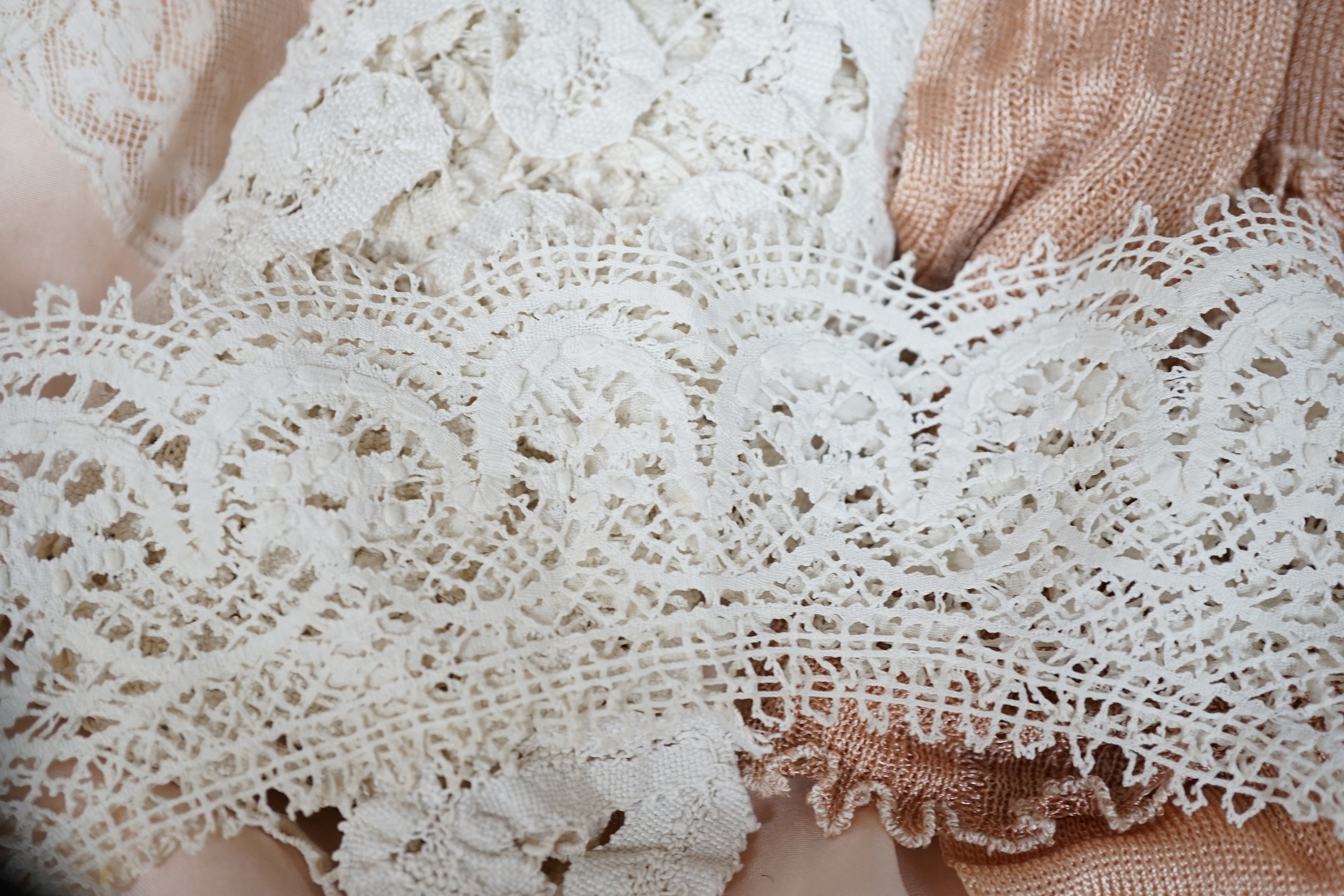 Two Edwardian pink silk and lace inserted camisole tops, a fine 1920’s blouse, a chemise and a pink silk knitted scarf, a bobbin lace collar and length of trimming